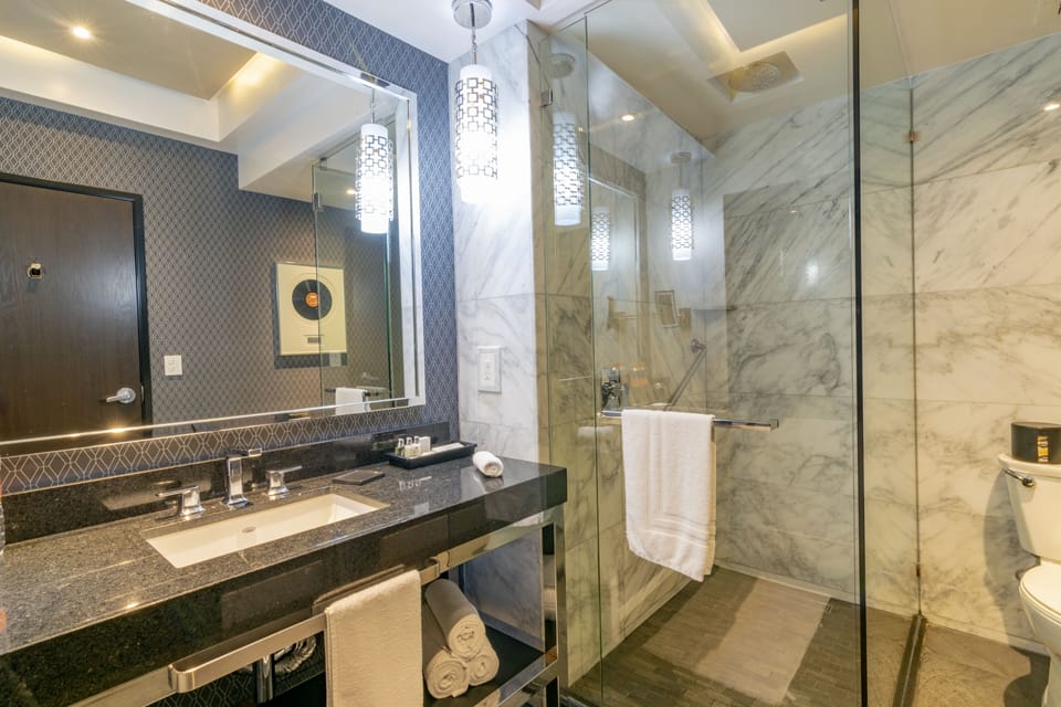 Premium Room, 2 Double Beds, Pool View | Bathroom | Shower, rainfall showerhead, free toiletries, hair dryer