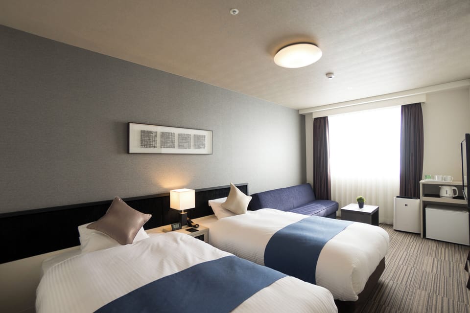 Moderate Twin Room for 2 people, Non Smoking | In-room safe, blackout drapes, iron/ironing board, free WiFi