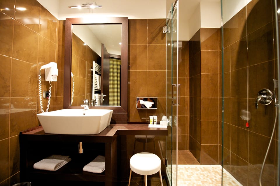 Shower, eco-friendly toiletries, hair dryer, bidet