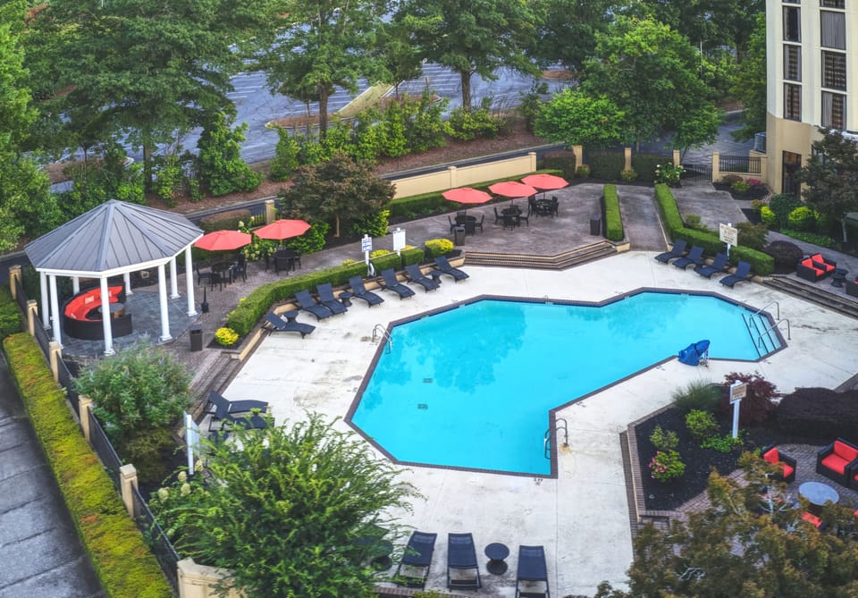 Outdoor pool, pool umbrellas, sun loungers