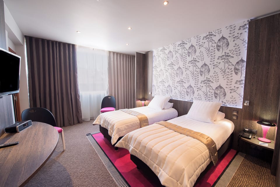 Premium bedding, free minibar, in-room safe, individually decorated