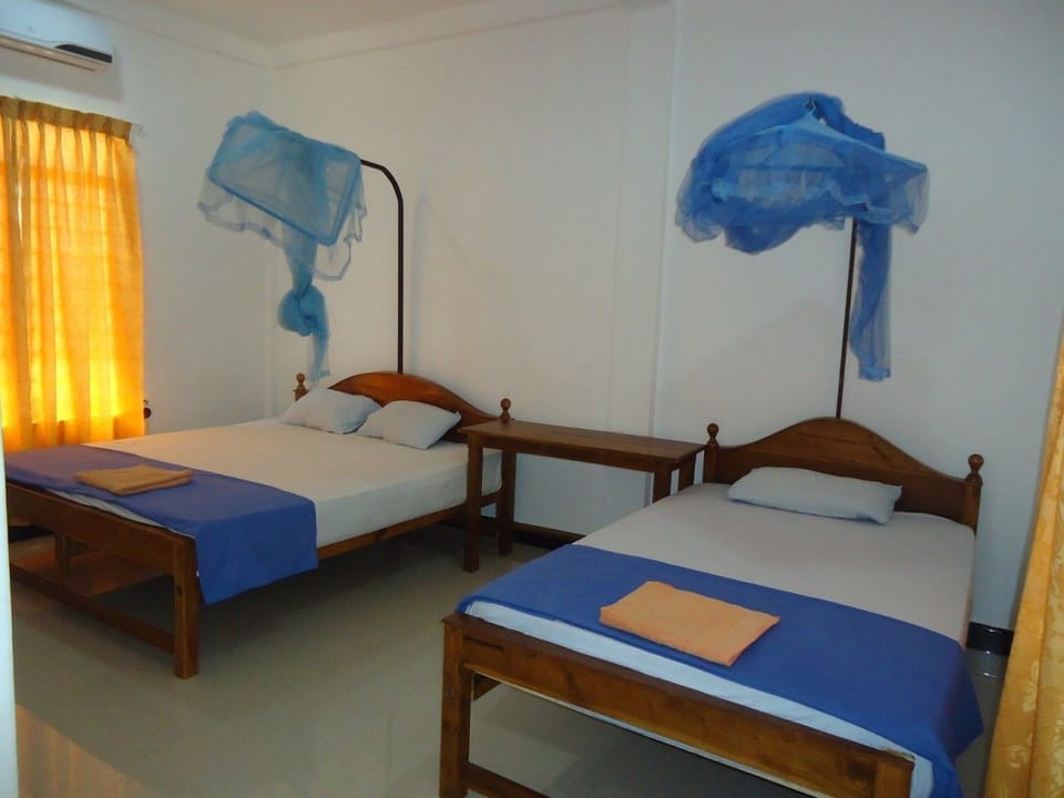 Basic Double or Twin Room, Garden View | Premium bedding, in-room safe, desk, iron/ironing board