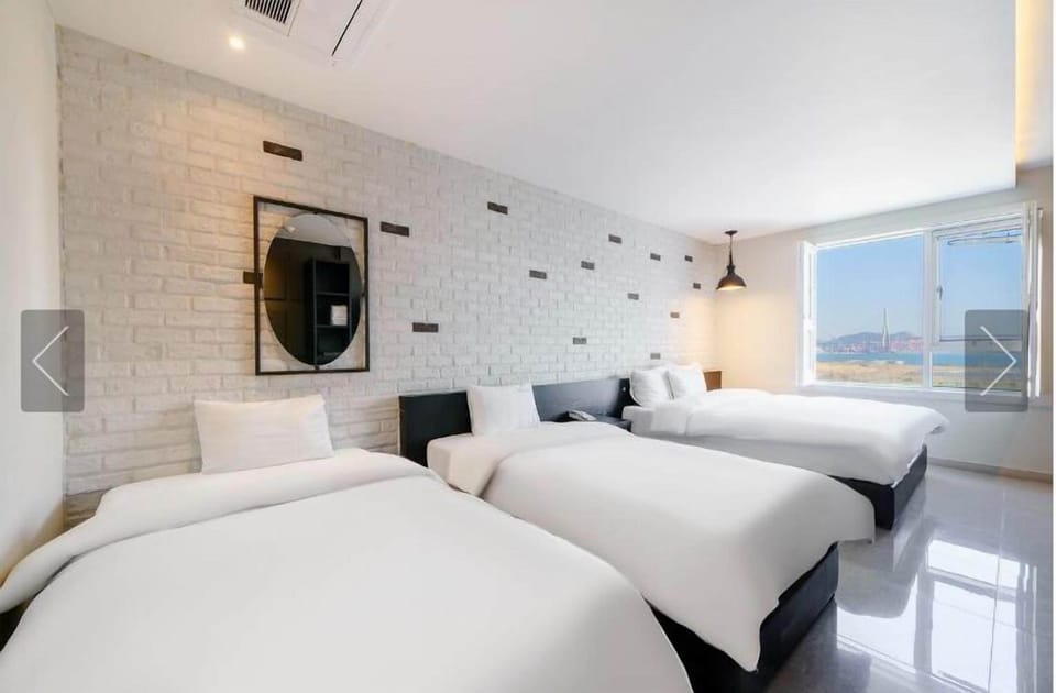 Family Quadruple Room, Ocean View | Premium bedding, soundproofing, free WiFi, bed sheets