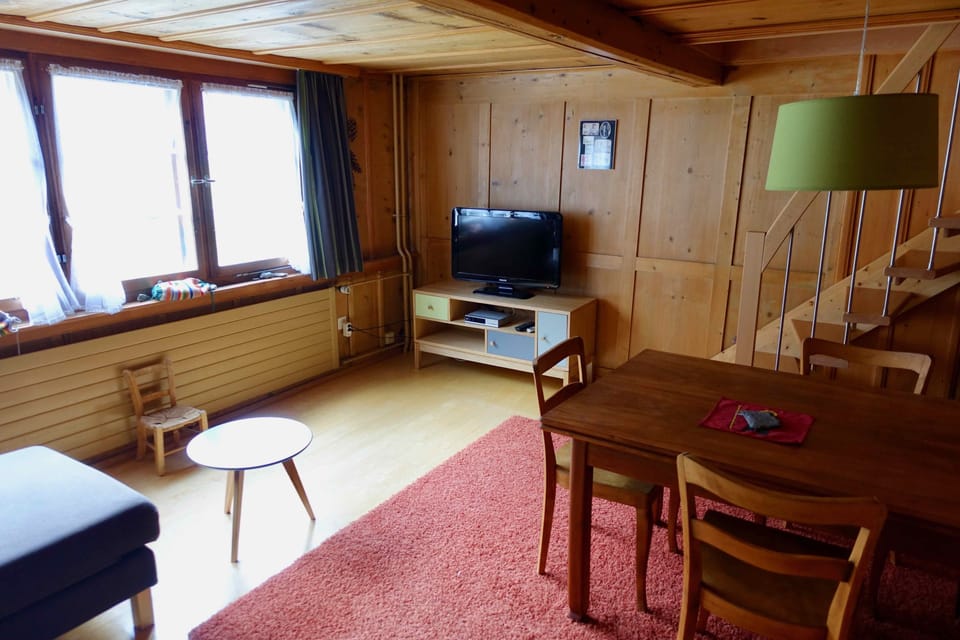 Apartment, 3 Bedrooms | Living area | Flat-screen TV