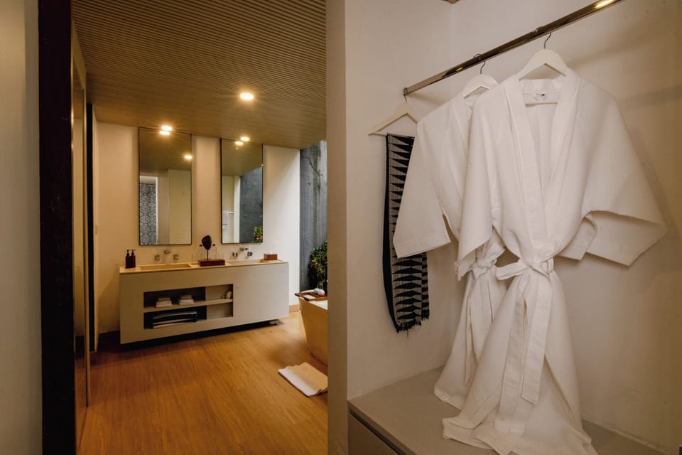 One Bedroom Pool Villa | Bathroom | Separate tub and shower, rainfall showerhead, free toiletries