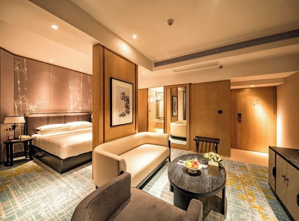 Suite, 1 Bedroom | 1 bedroom, down comforters, minibar, in-room safe