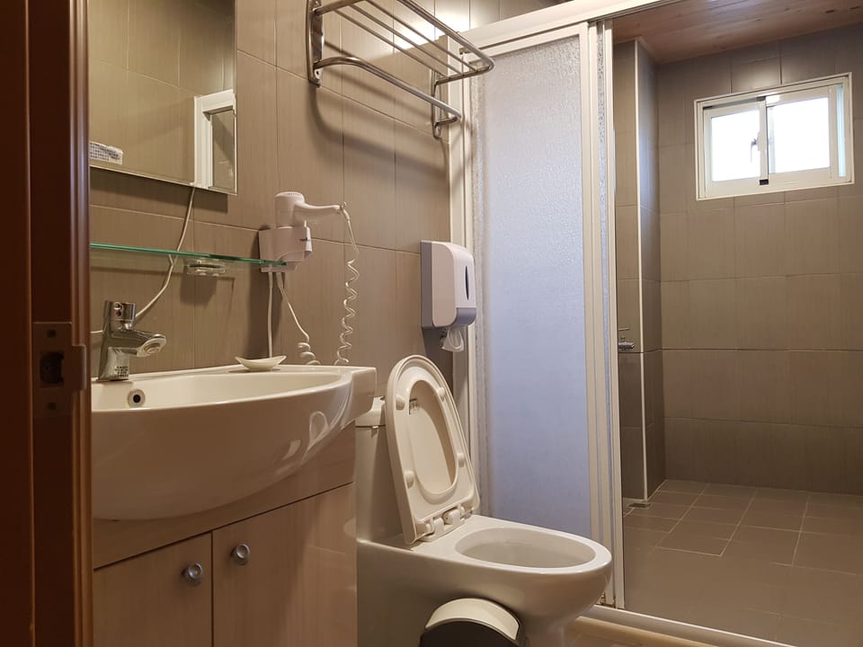 Quadruple Room, 2 Double Beds | Bathroom | Shower, free toiletries, hair dryer, slippers