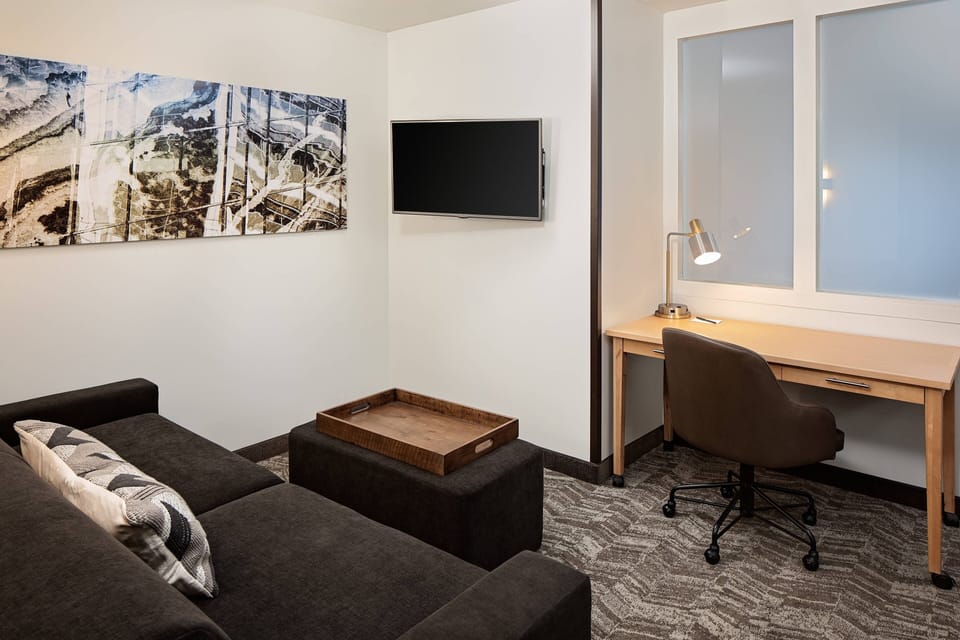 Premium bedding, pillowtop beds, desk, laptop workspace