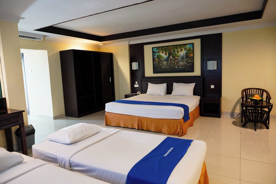 Quadruple Room with Balcony | Minibar, in-room safe, desk, free WiFi