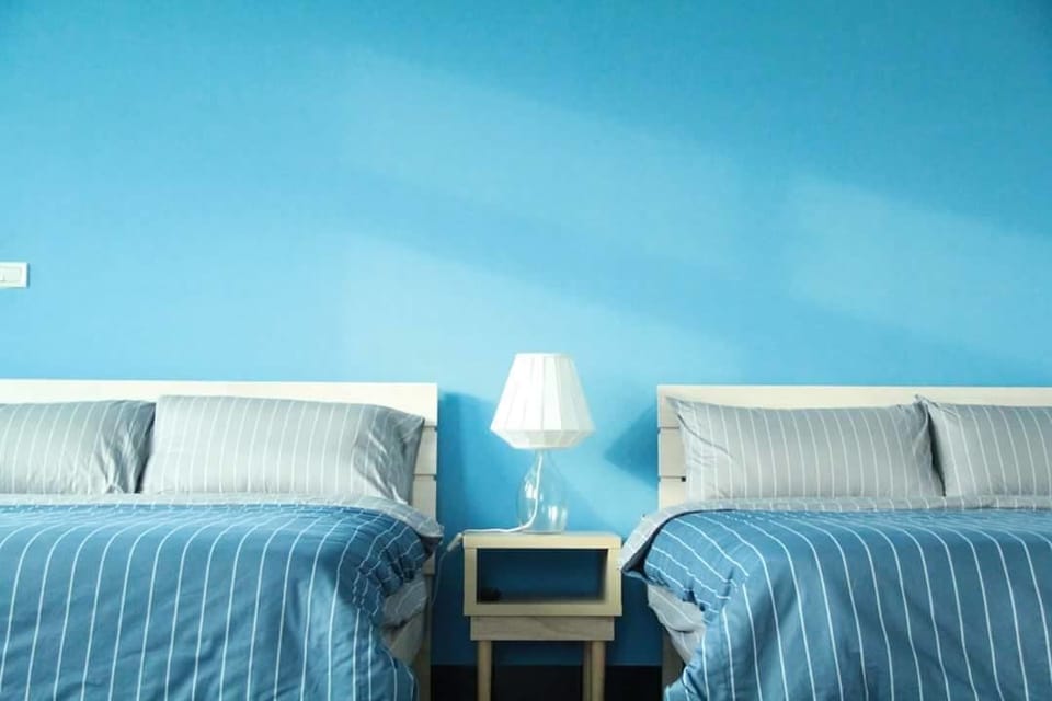 Quadruple Room | Desk, blackout drapes, WiFi (free), bed sheets