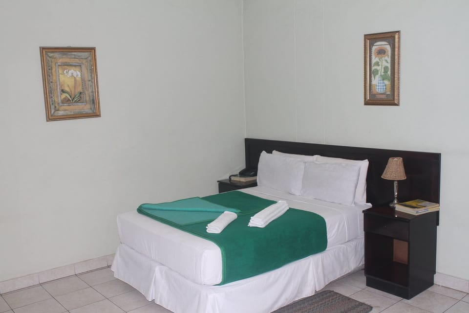 Standard Double Room, Garden View | In-room safe, desk, WiFi (free)