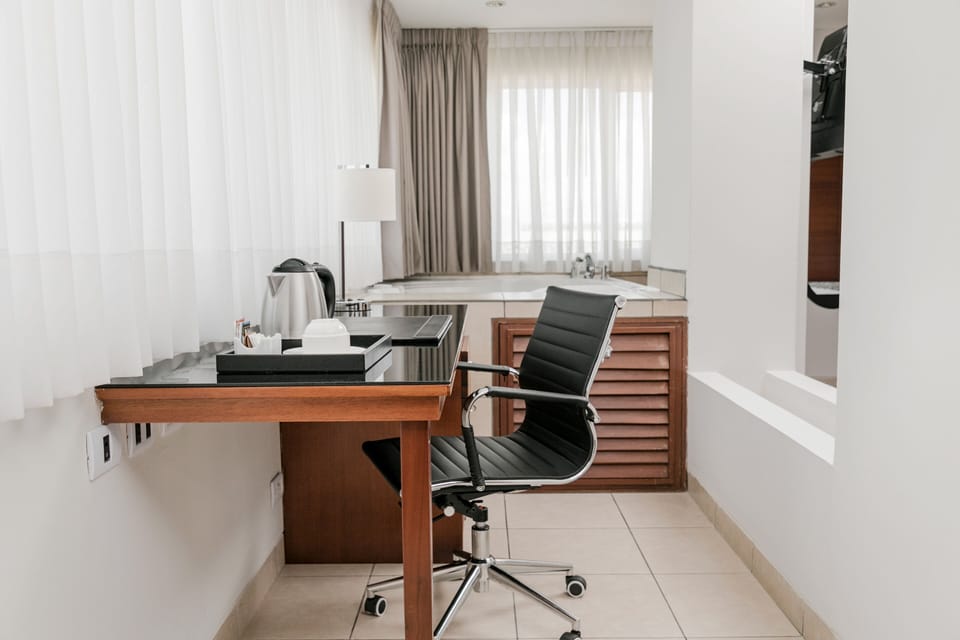 Hypo-allergenic bedding available, in-room safe, desk, laptop workspace