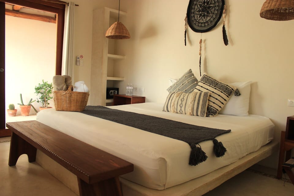 Junior Suite, Pool View | 1 bedroom, in-room safe