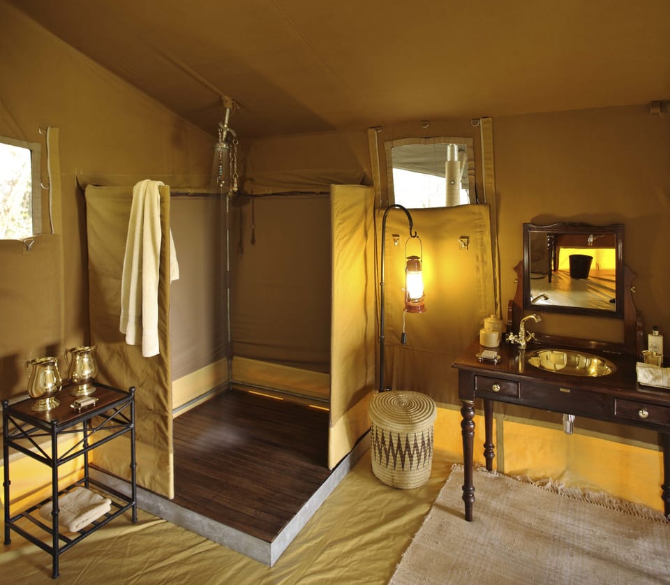 Luxury Tent | Bathroom | Shower, slippers, towels, toilet paper