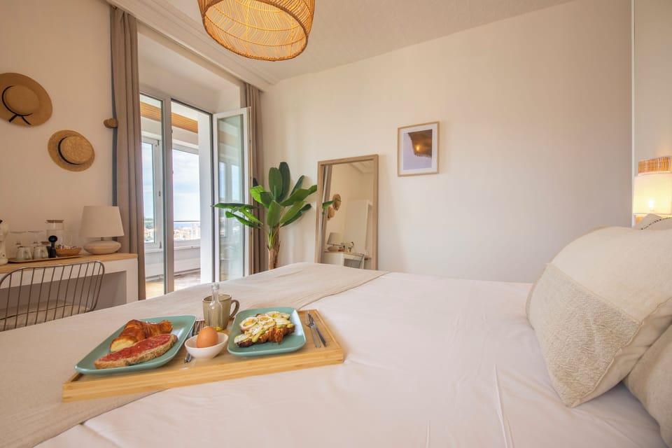 Deluxe Double Room, Private Bathroom, Ocean View | Individually decorated, individually furnished, free WiFi, bed sheets
