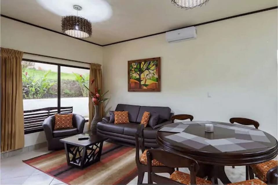 Family Room, 2 Bedrooms, Kitchen, Mountain View | Living area | 21-inch TV with cable channels