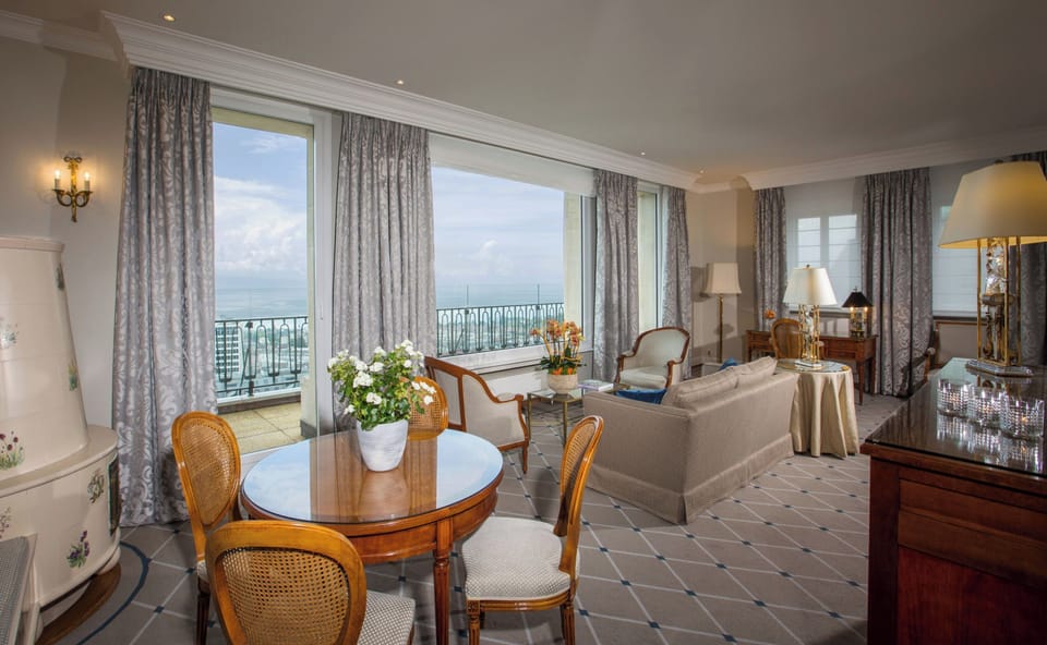 Executive Suite, Lake View | Minibar, in-room safe, soundproofing, iron/ironing board