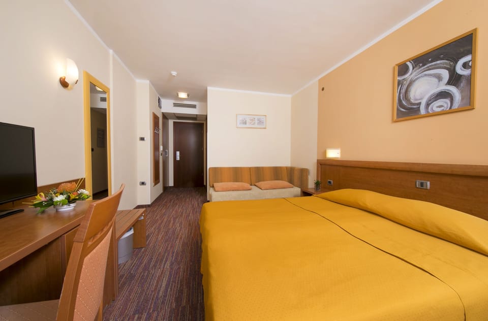 Double or Twin room with extra bed | Blackout drapes, free WiFi, bed sheets