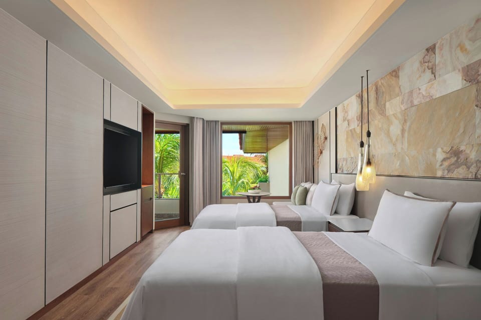 Premium bedding, down comforters, pillowtop beds, in-room safe
