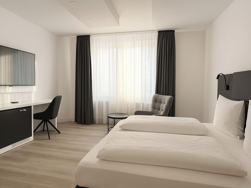 Comfort Double Room | Free minibar items, in-room safe, desk, iron/ironing board