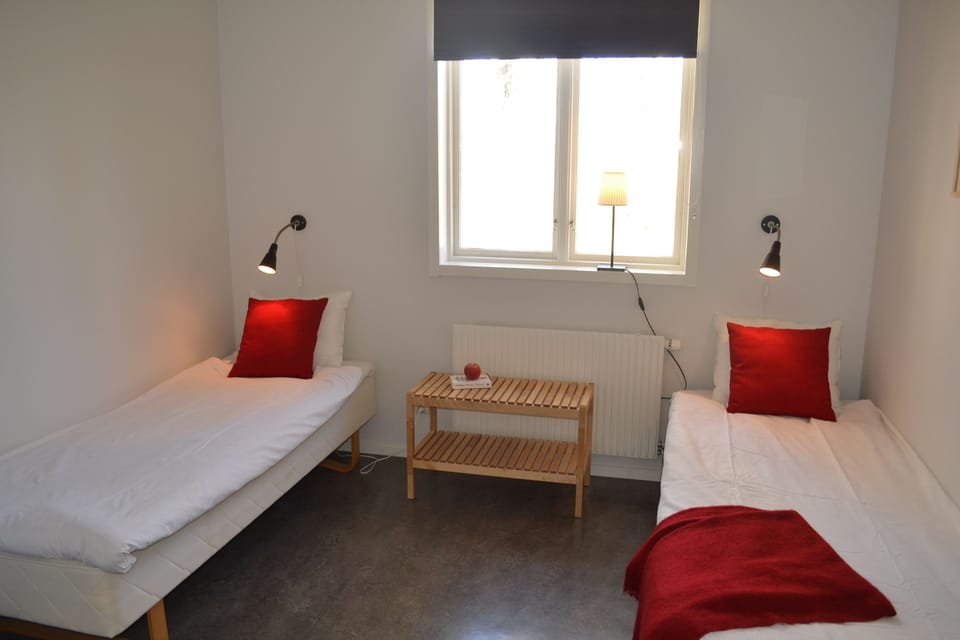 Twin Room, Shared Bathroom | Blackout drapes, WiFi (free)