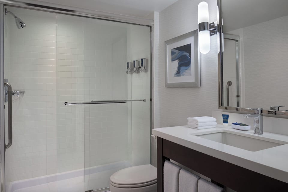 Eco-friendly toiletries, hair dryer, bathrobes, towels