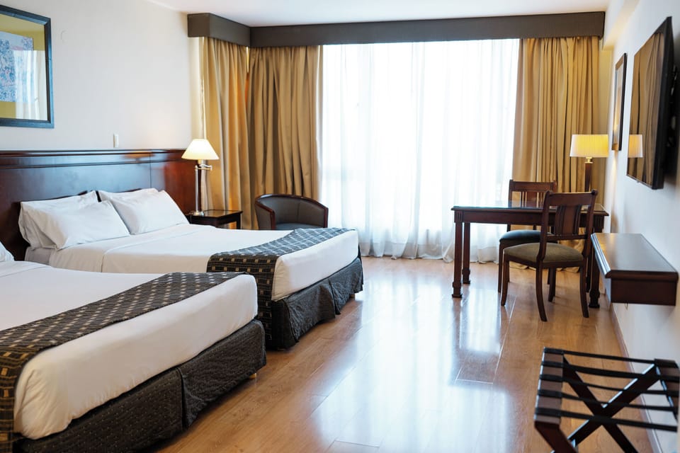 Family Room | Minibar, in-room safe, desk, soundproofing