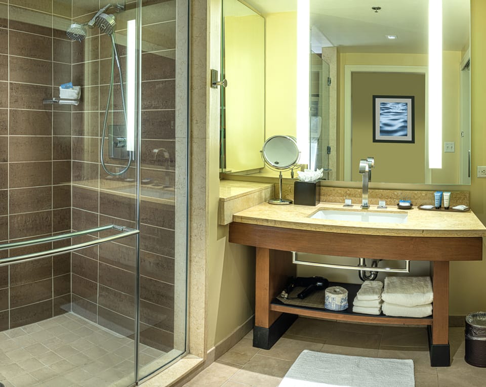 Designer toiletries, hair dryer, towels, soap