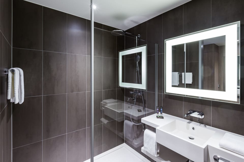 Shower, rainfall showerhead, eco-friendly toiletries, hair dryer