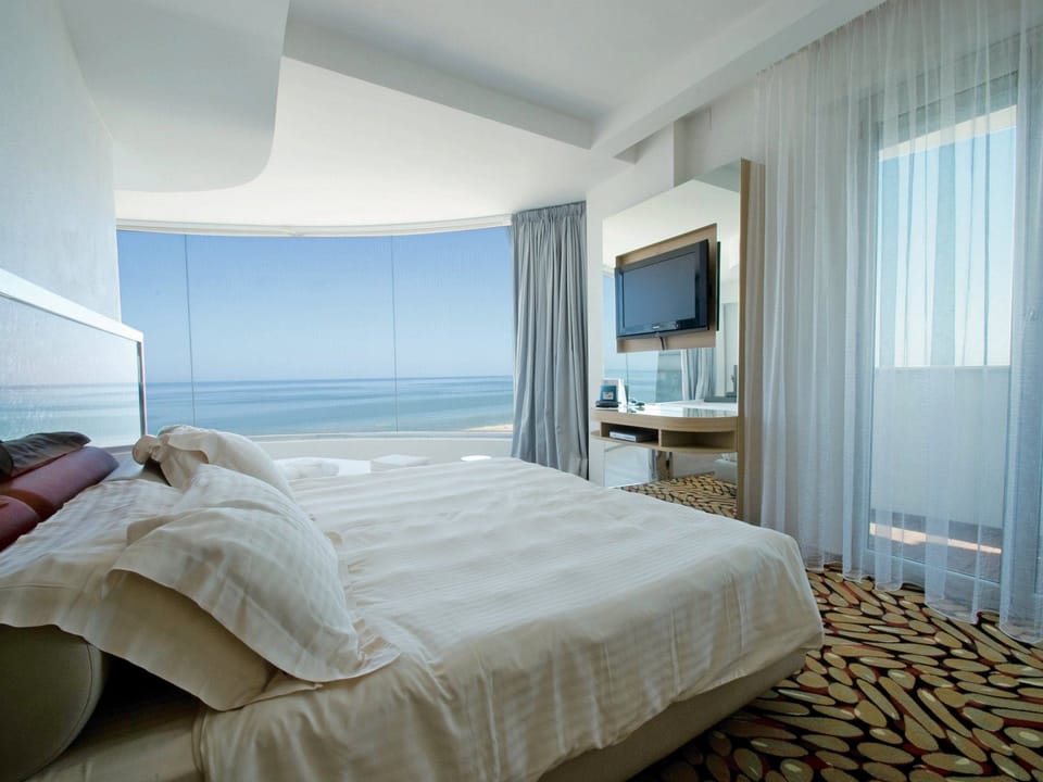 Junior Suite, Jetted Tub | Minibar, in-room safe, soundproofing, free WiFi