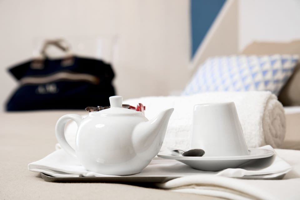 Premium bedding, down comforters, minibar, in-room safe