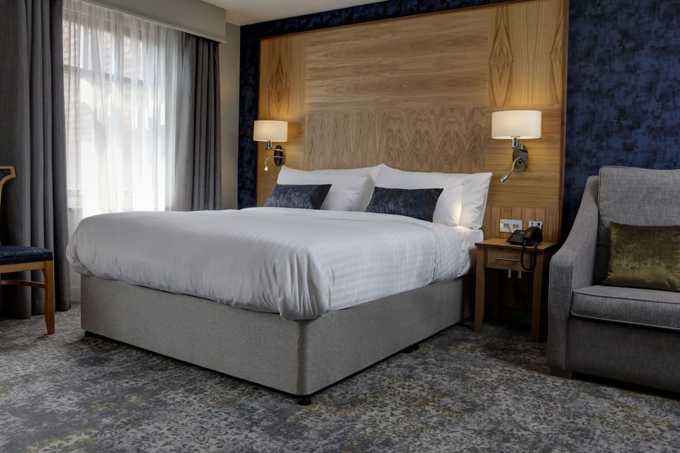 In-room safe, desk, iron/ironing board, free cribs/infant beds