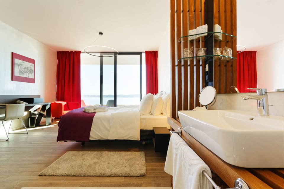 Superior Double or Twin Room, Balcony, Sea View | Living area | 32-inch LCD TV with premium channels, TV