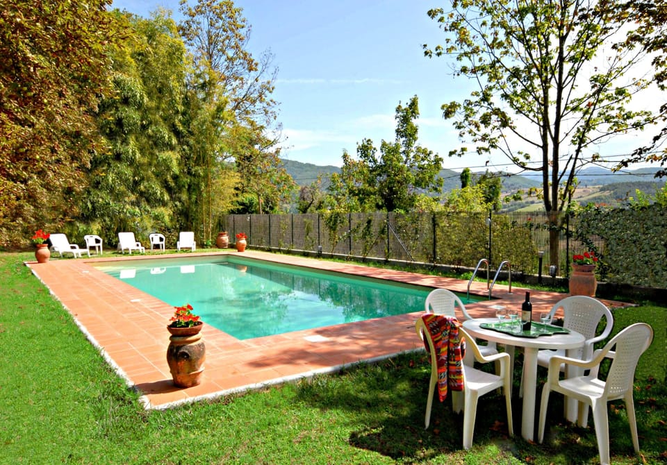 Seasonal outdoor pool, pool umbrellas, sun loungers
