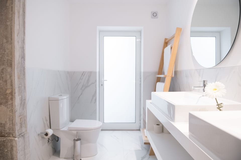 Master Suite | Bathroom | Designer toiletries, hair dryer, towels, soap