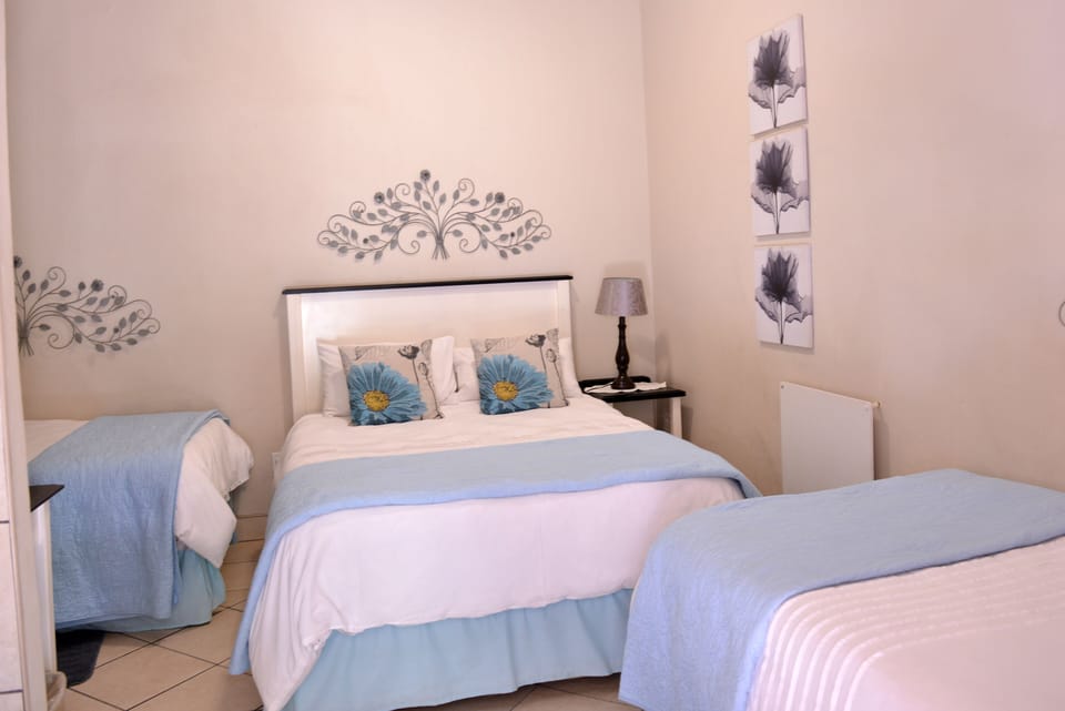 Comfort Quadruple Room | In-room safe, individually decorated, individually furnished, desk