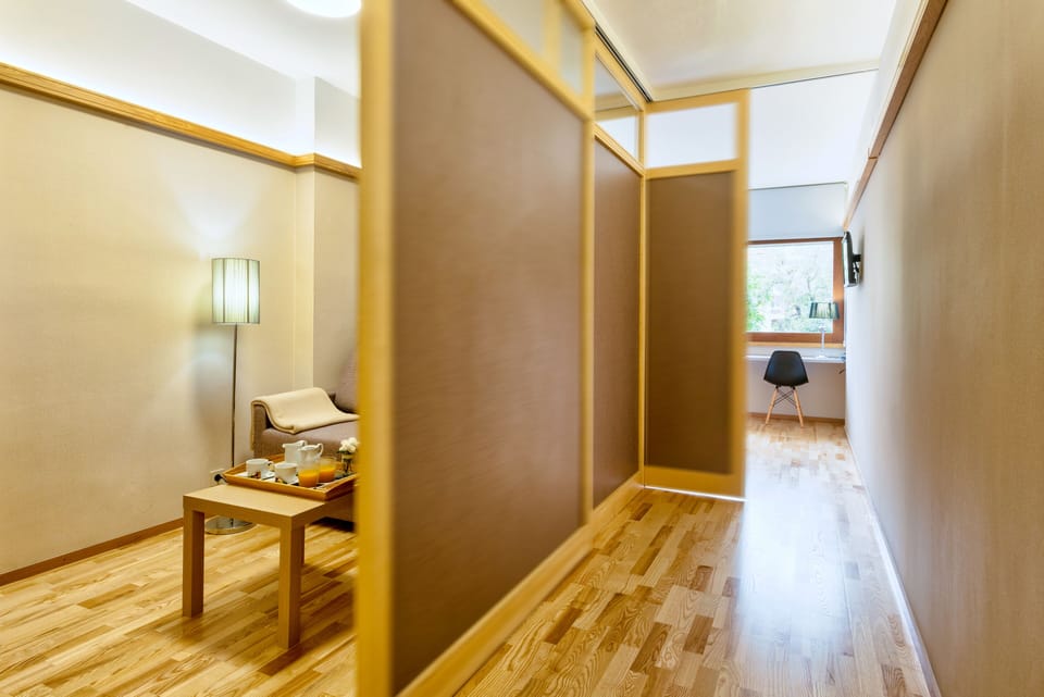 Standard Suite, Kitchenette | Minibar, in-room safe, desk, laptop workspace
