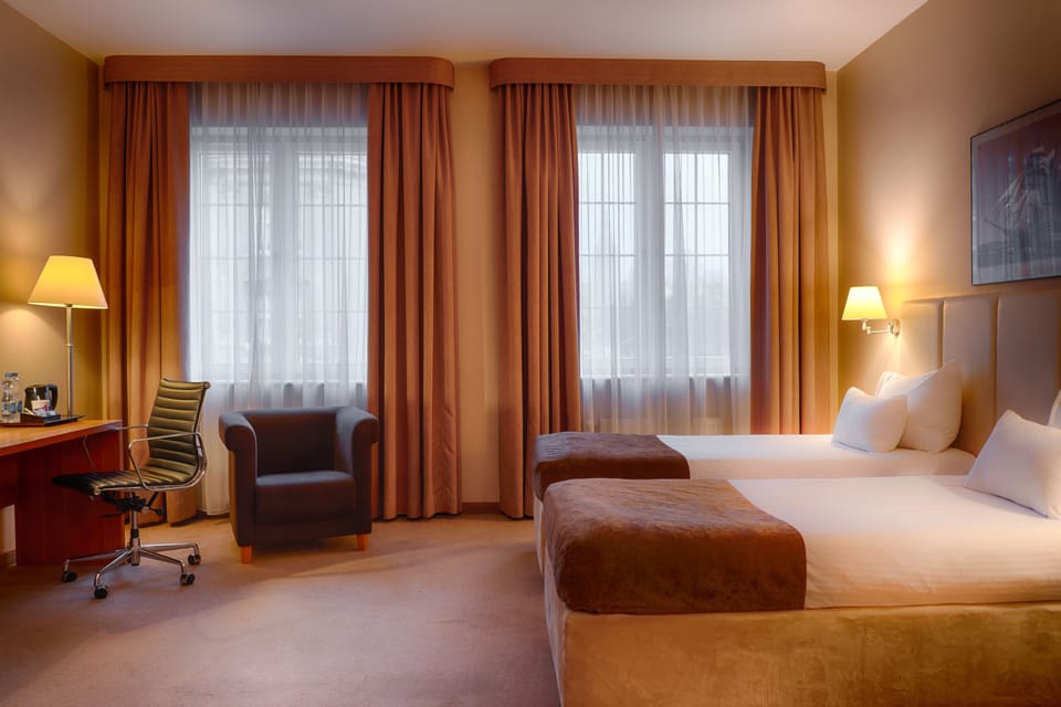 Hypo-allergenic bedding available, in-room safe, desk, laptop workspace