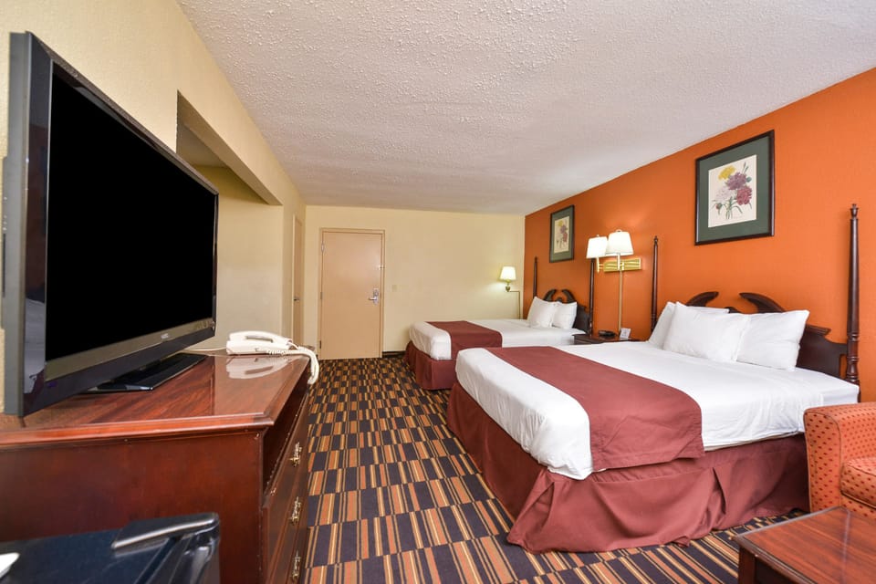 Deluxe Queen-Queen Room with Two Bed - Non Smoking  | Desk, blackout drapes, iron/ironing board, free WiFi