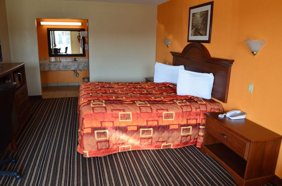 Premium bedding, pillowtop beds, desk, blackout drapes