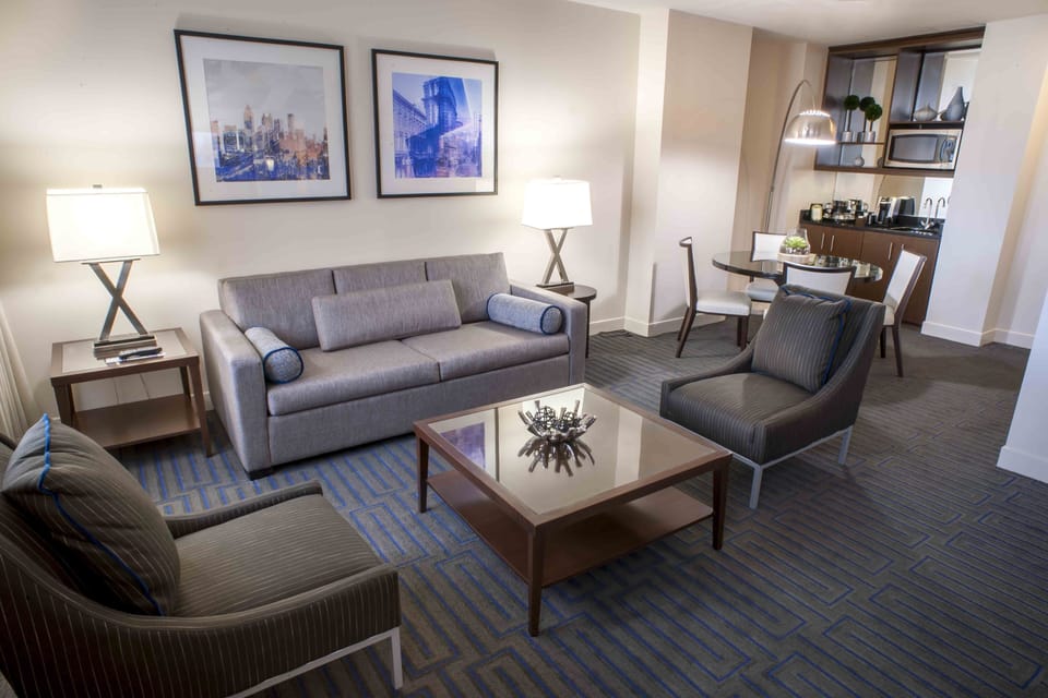 Executive Suite, 1 Bedroom | Living area | 49-inch TV with cable channels, Netflix, streaming services