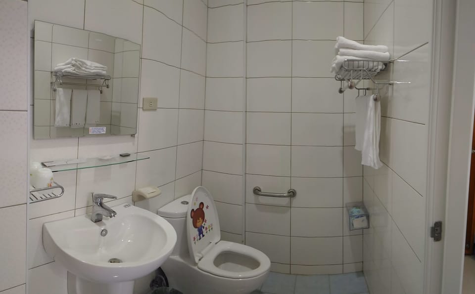 Basic Quadruple Room, 1 Bedroom, Accessible | Bathroom | Shower, free toiletries, hair dryer, slippers