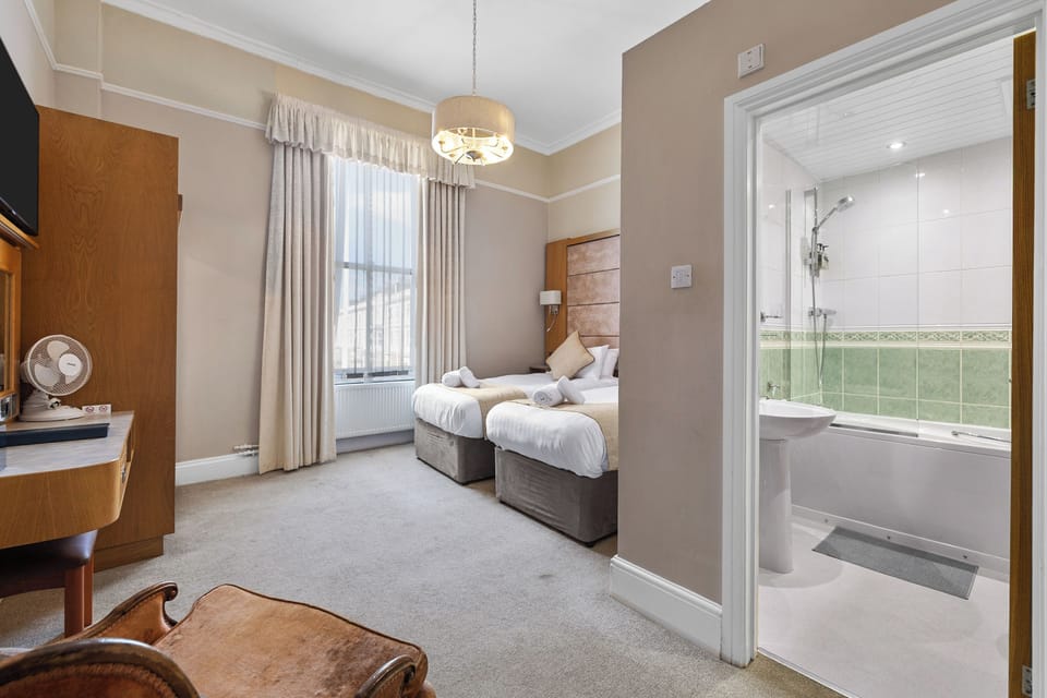 Superior King or Twin Room | Desk, blackout drapes, iron/ironing board, free WiFi