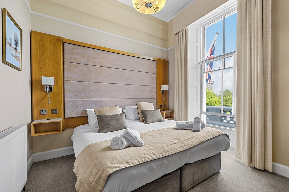 Superior King or Twin Room | Desk, blackout drapes, iron/ironing board, free WiFi