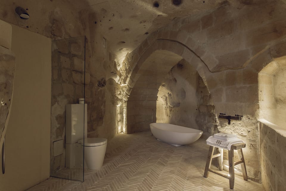 Exclusive Studio Suite | Bathroom | Designer toiletries, hair dryer, towels, soap