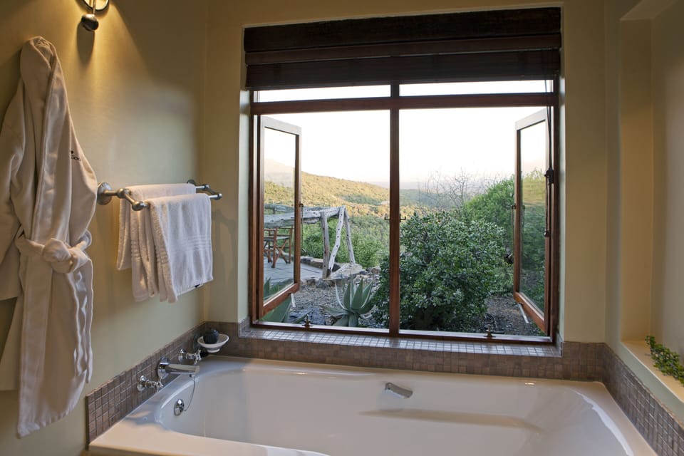 Separate tub and shower, deep soaking tub, rainfall showerhead