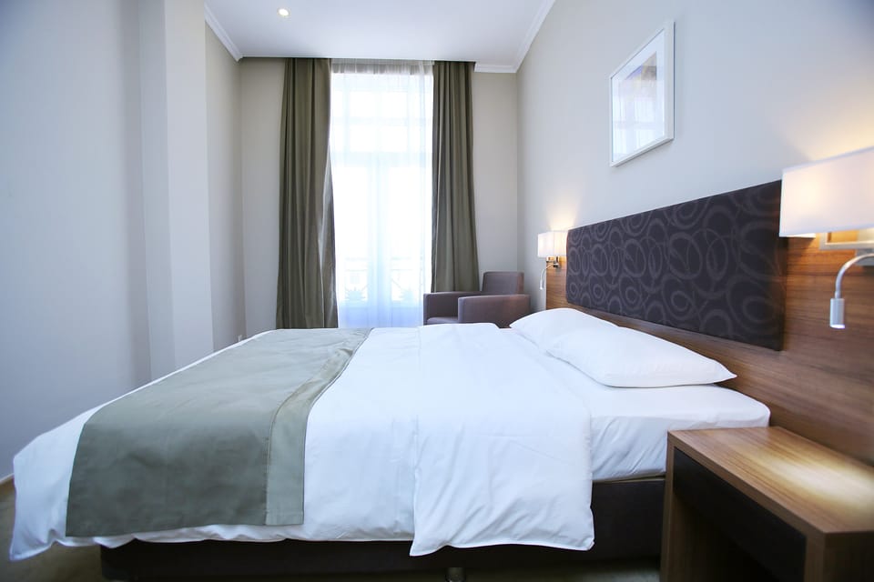 Superior Room (Deluxe) | Minibar, in-room safe, desk, blackout drapes