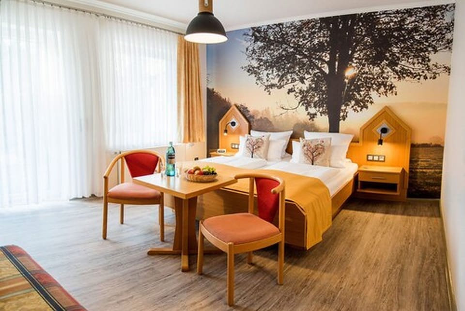 Comfort Room, 1 King Bed, Balcony, Mountain View | Minibar, in-room safe, soundproofing, free cribs/infant beds