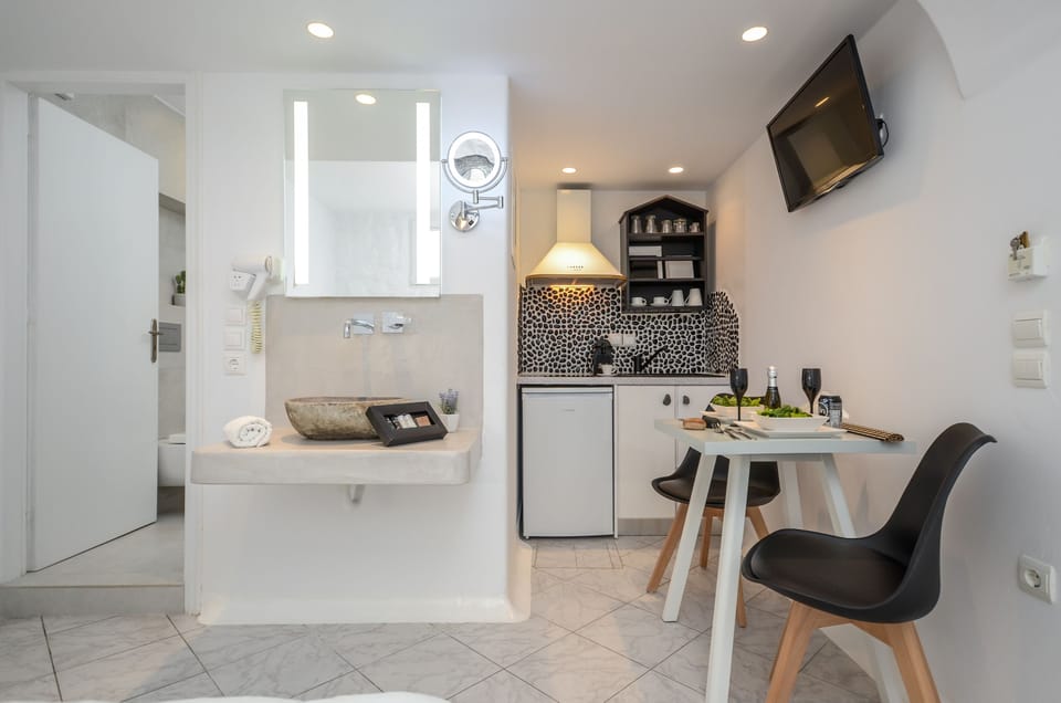 Standard Studio (No balcony) | Living area | 32-inch flat-screen TV with satellite channels, TV