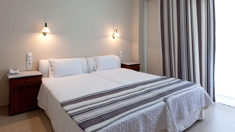 Hypo-allergenic bedding, memory foam beds, minibar, in-room safe